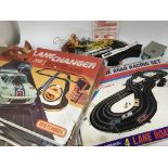 A collection of race way sets including Aurora race track and cars with some accessories, Matchbox ,