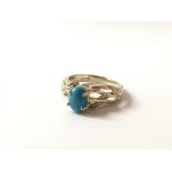 A 9ct gold ring with turquoise stone
