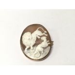 A Quality Carved cameo brooch dipicting two lions,