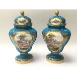 A pair of Quality 19th Century unmarked porcelain vase and covers of French Severs Style.