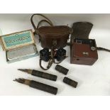 A pair of old wooden cased sailmaker's needles, box brownie camera, and Deraisme binoculars