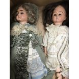 Two unmarked dolls with jointed limbs