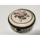 An Early 19th enamel box of circular shape with hand painted top and sides 6cm diameter. No damage.