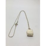 A Tiffany and Co.silver necklace with bag charm.Approx 22cm