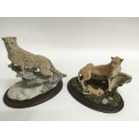 Two 'Country Artists' models of leopards