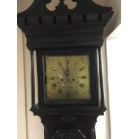 A Quality and rare late 18th Century Carved Oak longcase clock with a brass dial and eight day going