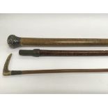 A silver topped walking stick, horn handled cane and one other - NO RESERVE