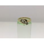 An 18ct gold three stone diamond ring, approx .75ct, approx 4.6g and approx size K.
