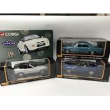 A collection of boxed 1:18 scale diecast vehicles including Corgi MGF, Maisto special editions, 1965