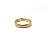 A 22ct gold wedding band, weight approx 6.5 grams, ring size P/Q.