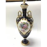 A Quality Royal Crown Derby hand painted porcelain vase with panels of flowers. Signed C Harris.