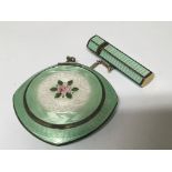 A Quality green enamel enamel and Parcel gilt compact and cigarette holder.