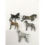 Five silver horse and dog brooches by Kenart and Louie Taylor