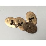 A pair of 9carat gold gents cufflinks weight 7.4g.