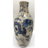 A large Chinese crackleware vase painted with a blue five claw dragon.Approx 55cm high, top cut