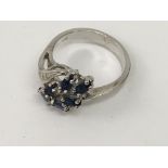 A 14ct, white gold and sapphire ring.Approx L/m