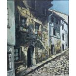 A framed oil on canvas depicting a Mediterranean cobbled street, the main terrace house having