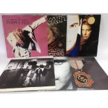 A record box of LPs, 12inch and 7inch records by various artists including Phil Collins, Alison