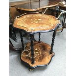 An inlaid Italian two tier drinks trolley with mount to hold three bottles to the bottom level.
