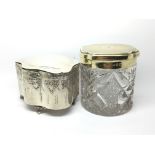 A silver decorative trinket box with hallmarks for