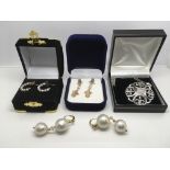 Three pairs of 9ct gold earrings and a silver necklace (4).