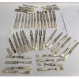 A collection of mother of pearl silver plated fish knives and forks