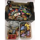 A box of playworn die cast cars including Corgi with plastic soldiers and farm animals