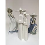 A Lladro figure of two nuns plus two Nao ladies. No damage or restoration