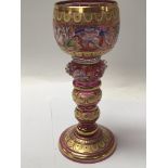 A Quality enamel and gilt decorated Venetian glass goblet with a knoped stem. Height 17.5cm
