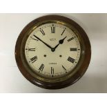 A Smiths Of Enfield wall clock, without pendulum and key. No glass over face. Face diameter approx