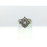 A 9ct gold diamond cluster ring, approx 3.4g and approx size O-P.