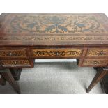 A 19th century Sorrento inlaid side table fitted with five drawers on square tapering legs 90 cm