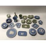 A collection of blue and green Wedgwood jasper ware, containing approximately 40 pieces.