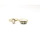 Two ladies 9ct gold rings set with opalescent stones. Total weight approx 3.6 grams.