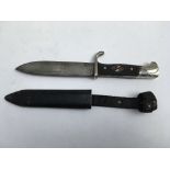 A Hitler Youth style knife bearing no marks. Blade length approx 14cm, total 24cm. Scabbard