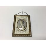 A quality 19th century oval framed portrait miniature of a lady in fine clothing, mounted in a