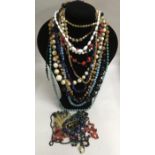 A collection of vintage bead necklaces including hardstone