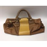 A Beige leather Dayaday travel, bag with ostrich style panel