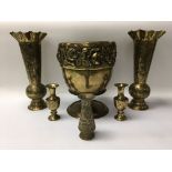 A group of brass to include a jardiniere, two vases and three miniatures.