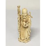 A Quality Carved ivory early 20th Century carving of a good luck Fu Lu Shou figure. Height 11cm.