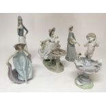 Four Lladro figures comprising a boxed 'Fountain of Love' cherub no damage or restoration, a dancer,