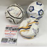 Three multi signed footballs and a programme