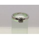 An 18ct white gold solitaire ring, approx .75ct, approx 5.14g and approx size O-P.