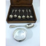 A William IV, London silver teaspoon, six decorative sterling spoons and a bangle