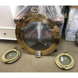 Three brass ship's portholes including a large example, approx 72x72cm