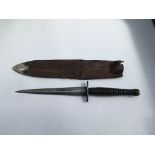 An unmarked dagger with a Sheffield leather scabbard. Blade length approx 17cm, 30cm overall.