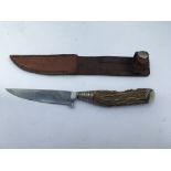 A German Hunting knife with Hugo Koller solingen Marks. Blade length approx 11cm, 22cm total length.