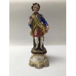 A porcelain figure of a Georgian gentleman, height approx 30cm.