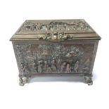 A Continental metal trinket box decorated with raised figures with a bronze finish. The base with