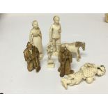 A collection of small carved ivory figures including 19th Century French and Japanese figures height